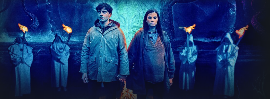Sacrifice (2021) - a man and his pregnant wife stand in the middle of the image, with hooded figures behind them and tentacles rising from the water of a fjord.